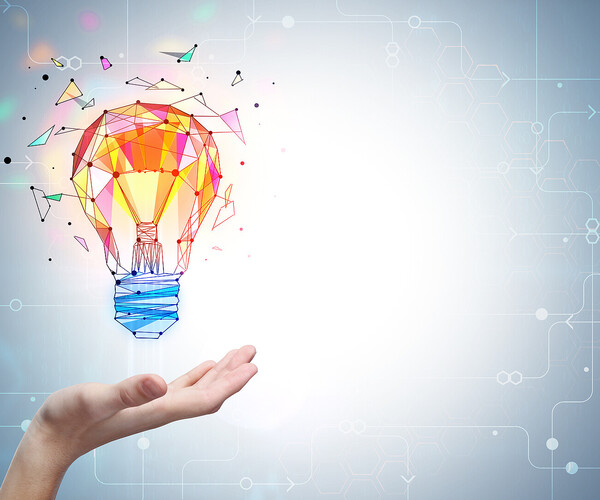 große Glühbirne fliegt über Hand